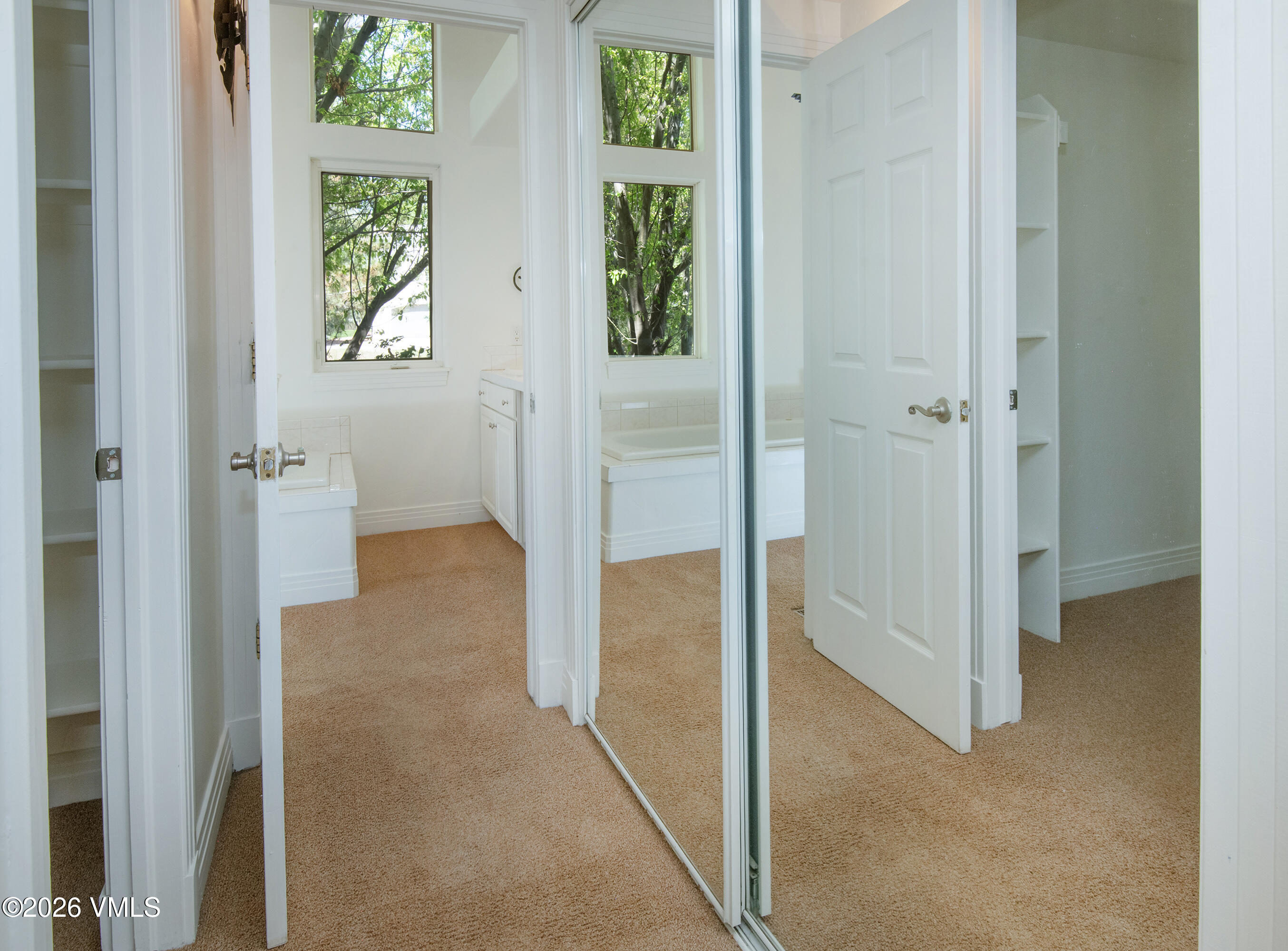 471 Rawhide Road Edwards, CO 81632 - Photo 18 of 51 a view of a hallway with wooden floor and closet