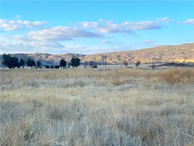 a view of lake with mountain