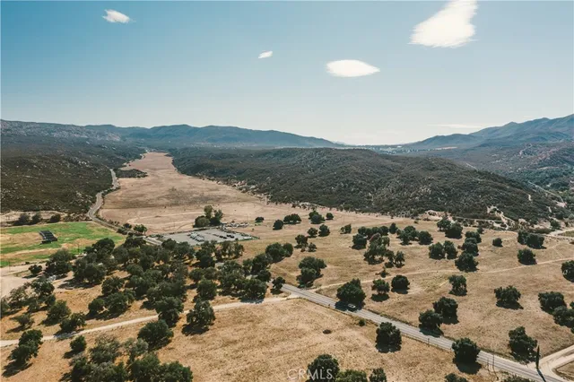 a view of a large body of water with a mountain