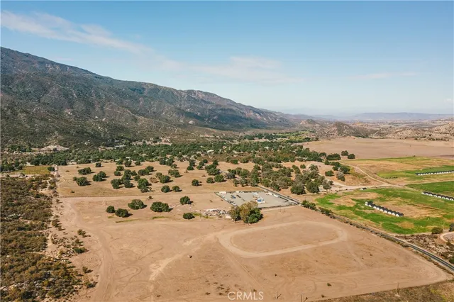 an aerial view of residential building and ocean