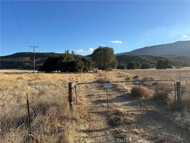 a view of swimming pool with a yard
