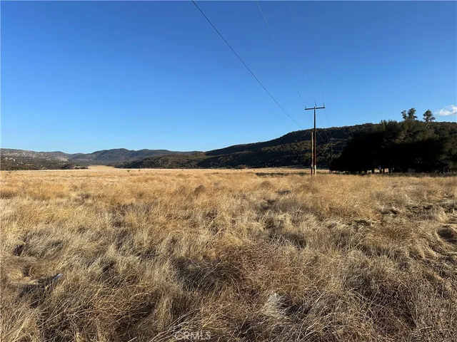 a view of yard with an ocean
