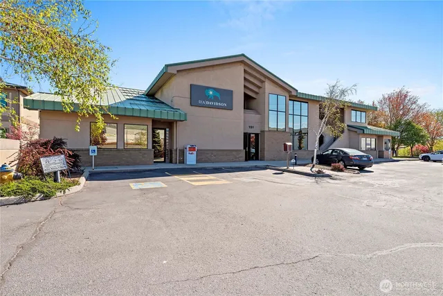 a view of a street with a house