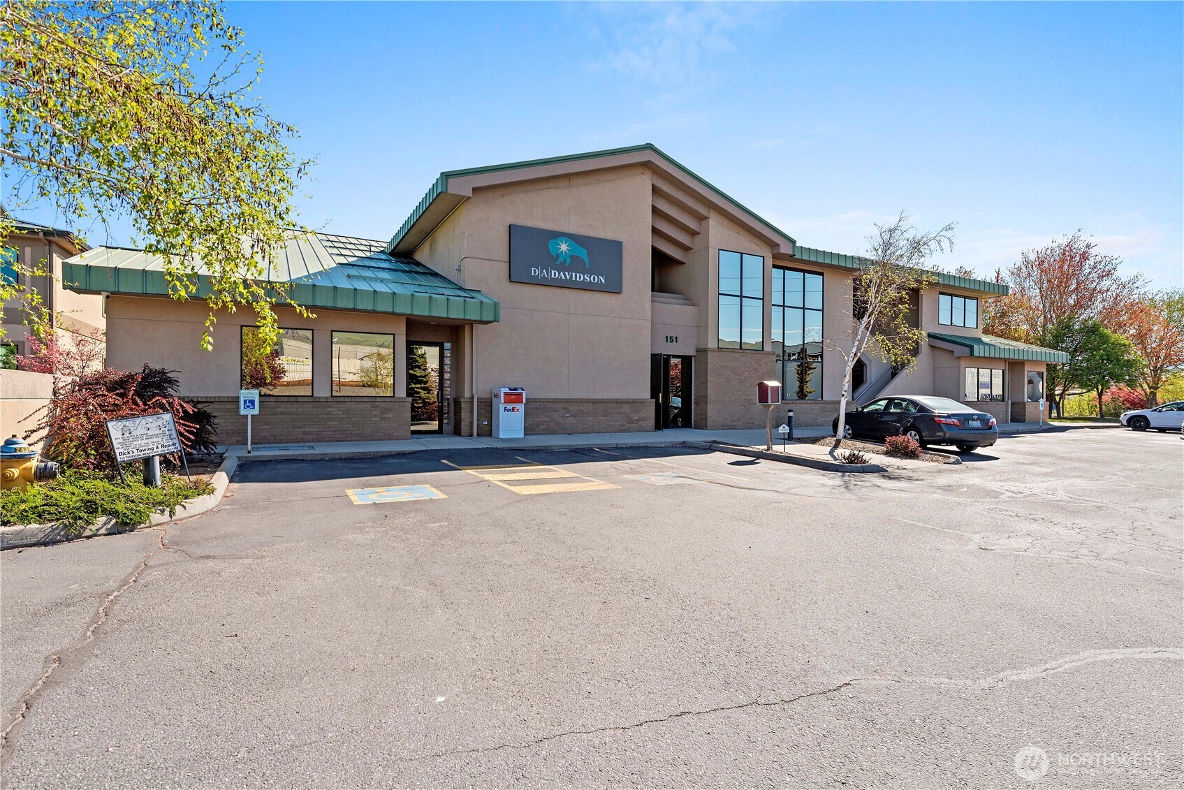 151 South Worthen Street, Unit 1 Wenatchee, WA 98801 - Photo 1 of 27 a view of a street with a house