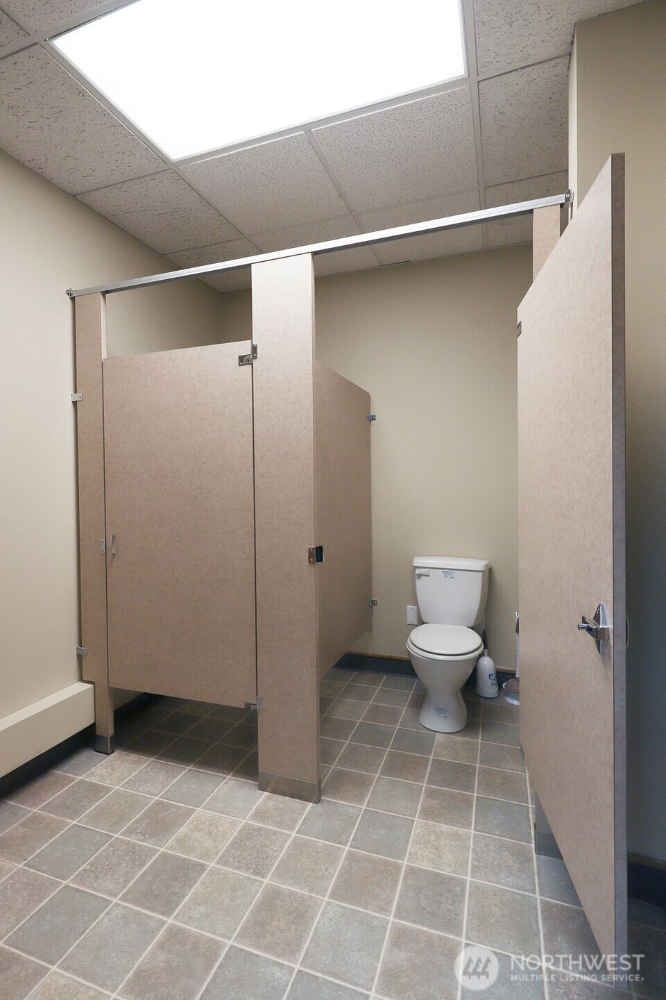 151 South Worthen Street, Unit 1 Wenatchee, WA 98801 - Photo 17 of 27 a bathroom with a toilet and a shower
