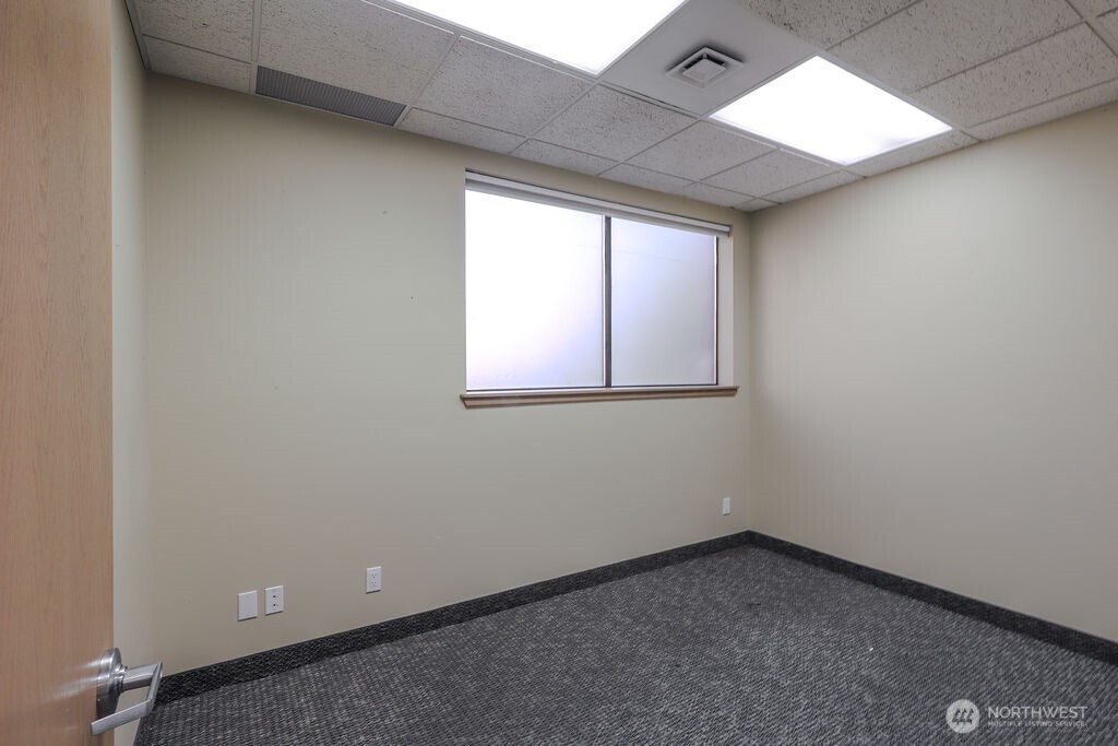 151 South Worthen Street, Unit 1 Wenatchee, WA 98801 - Photo 18 of 27 an empty room with a window