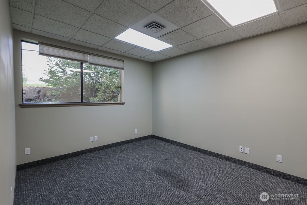 151 South Worthen Street, Unit 1 Wenatchee, WA 98801 - Photo 21 of 27 a view of an empty room with a window