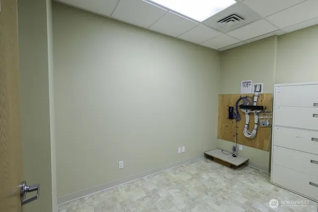 a view of a city street with cars