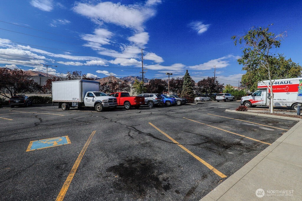 151 South Worthen Street, Unit 1 Wenatchee, WA 98801 - Photo 26 of 27 a view of a city street with cars
