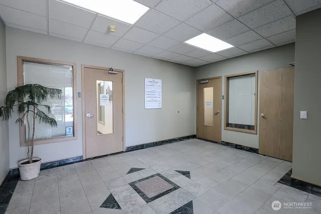 an empty room with windows