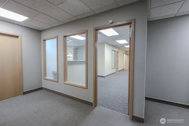 an empty room with windows