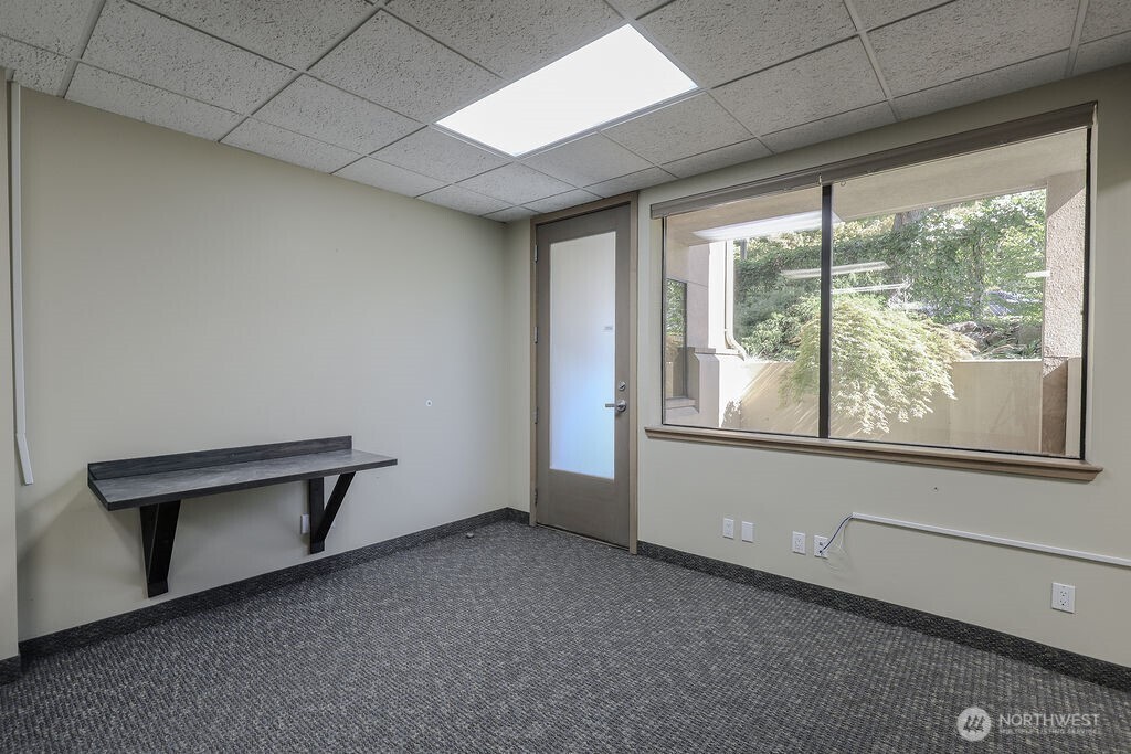151 South Worthen Street, Unit 1 Wenatchee, WA 98801 - Photo 10 of 27 a view of an empty room with a window