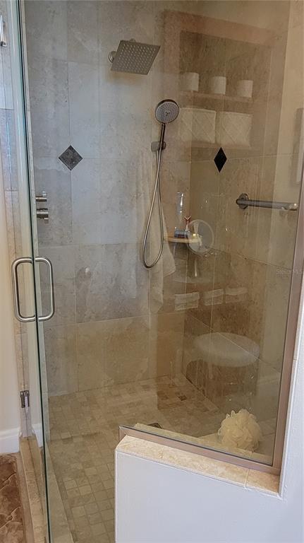 50 Central Avenue, Unit 16A Sarasota, FL 34236 - Photo 17 of 44 a bathroom with a shower