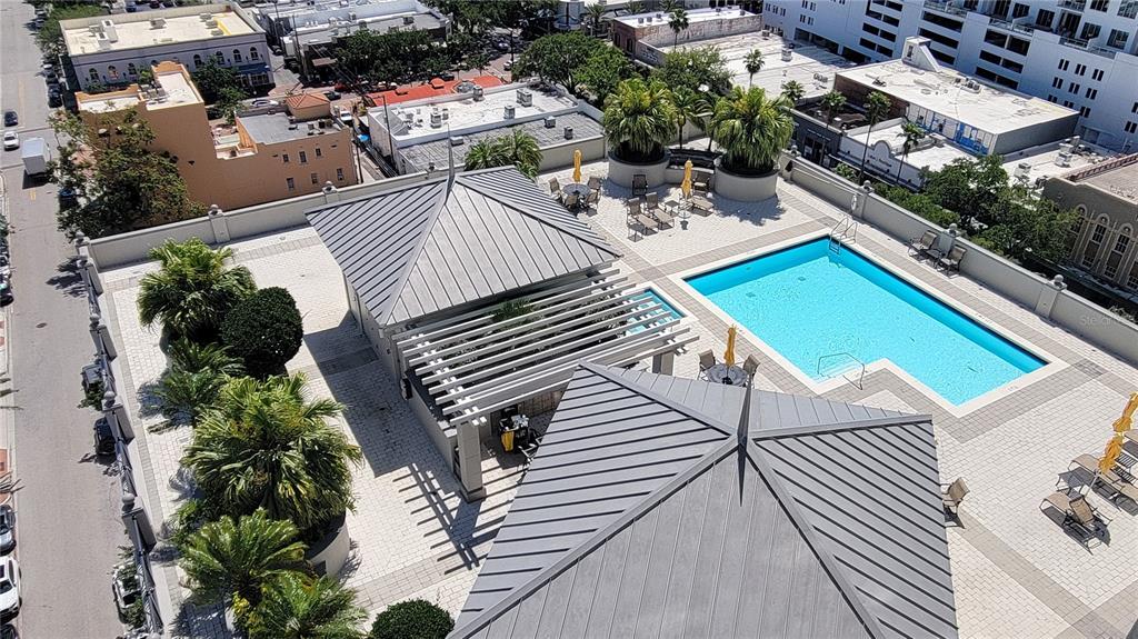 50 Central Avenue, Unit 16A Sarasota, FL 34236 - Photo 22 of 44 an aerial view of a house with a yard and potted plants