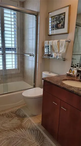 a view of a hallway with washer and dryer