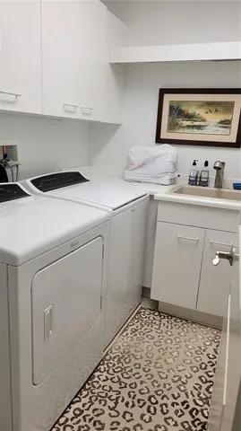 a room with table chairs and a dining table