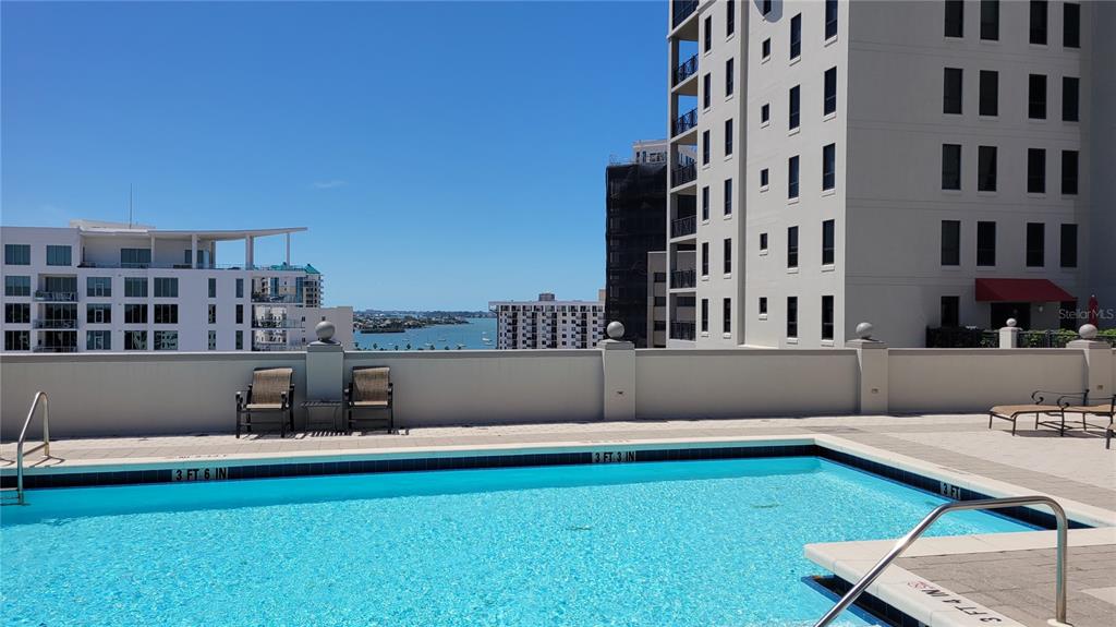 50 Central Avenue, Unit 16A Sarasota, FL 34236 - Photo 28 of 44 a swimming pool with outdoor view