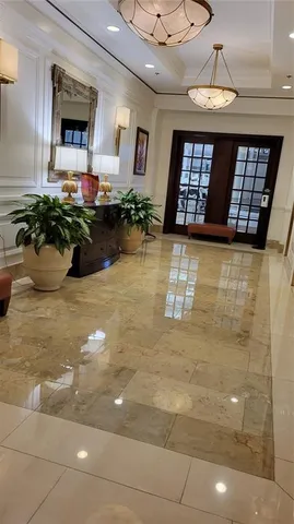 a view of a livingroom with furniture and window