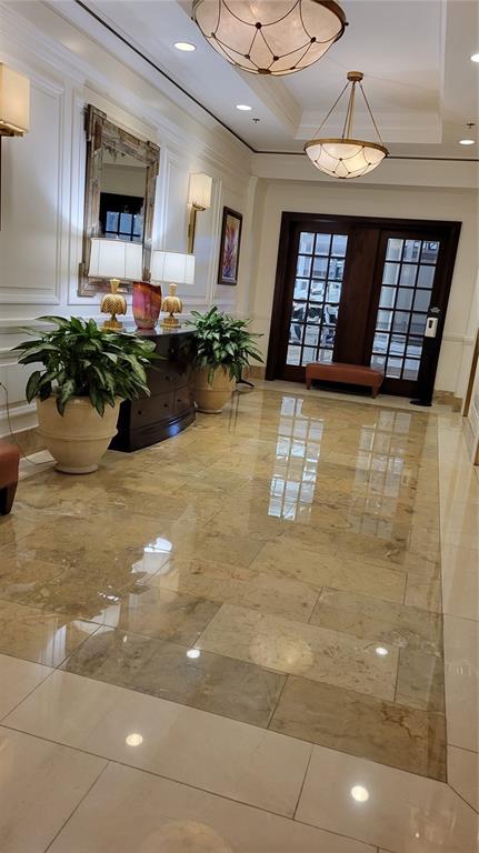 50 Central Avenue, Unit 16A Sarasota, FL 34236 - Photo 3 of 44 a view of a livingroom with furniture and window