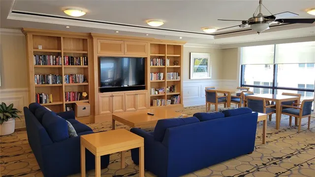 a kitchen with cabinets and stainless steel appliances