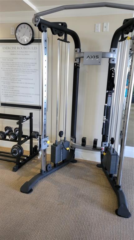 50 Central Avenue, Unit 16A Sarasota, FL 34236 - Photo 38 of 44 a bedroom with bed and a large mirror