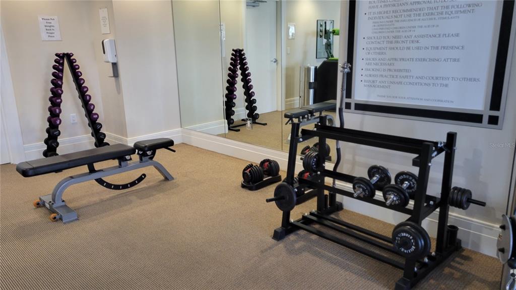 50 Central Avenue, Unit 16A Sarasota, FL 34236 - Photo 39 of 44 a view of a room with gym equipment