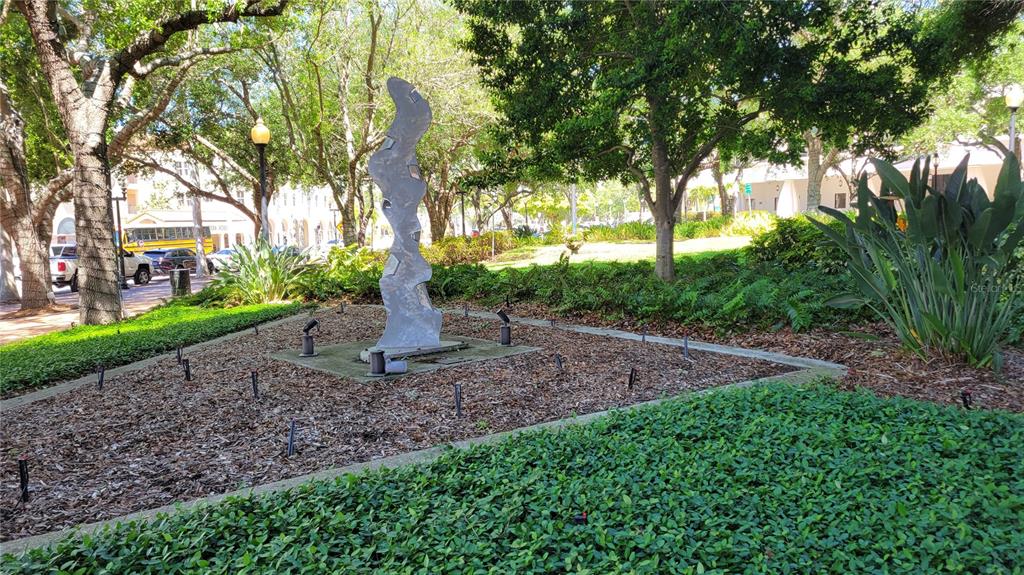 50 Central Avenue, Unit 16A Sarasota, FL 34236 - Photo 41 of 44 a view of a backyard with tree s