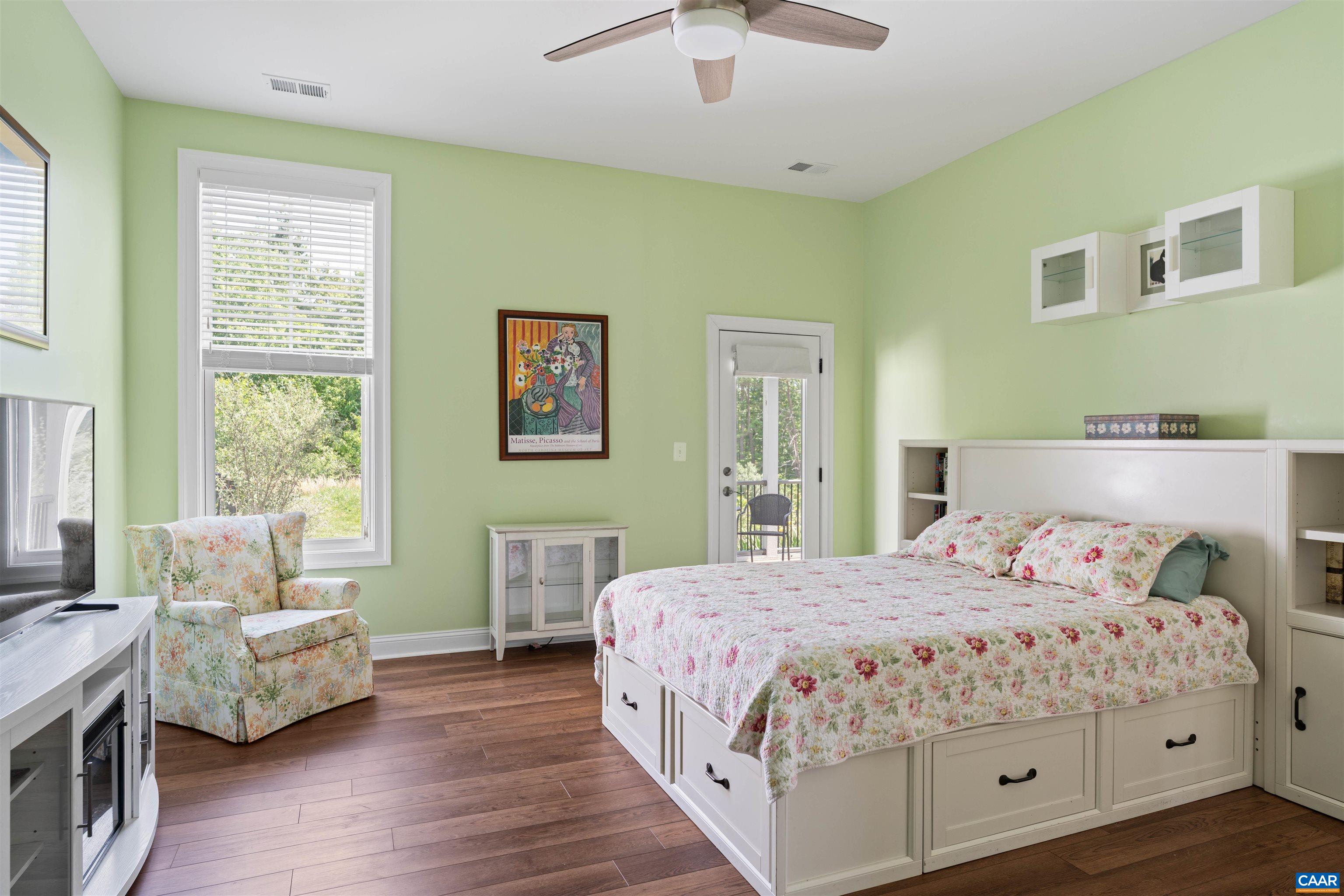 322 Claibourne Road Crozet, VA 22932 - Photo 9 of 25 a bedroom with a bed and a couch