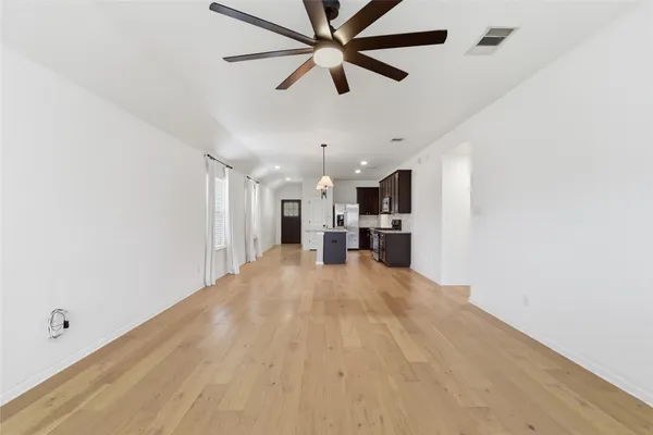 a bathroom with a sink a mirror and a shower