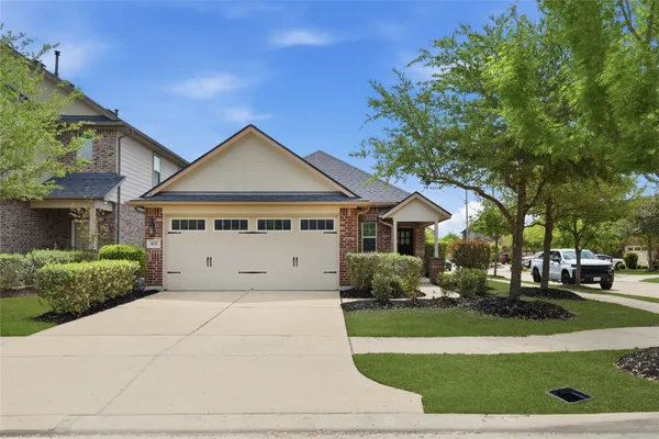 a house with yard in front of it