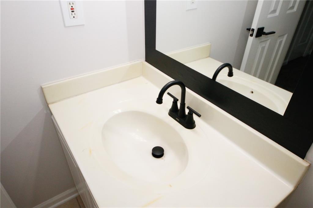 4645 Valais Court, Unit 90 Alpharetta, GA 30022 - Photo 16 of 24 a close up of a sink