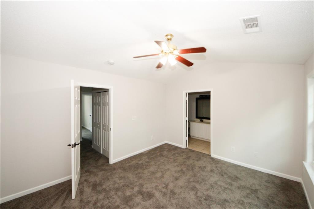 4645 Valais Court, Unit 90 Alpharetta, GA 30022 - Photo 18 of 24 an empty room