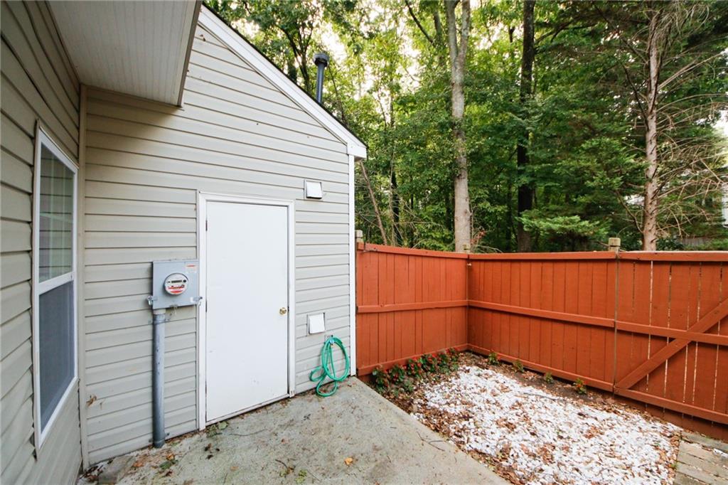 4645 Valais Court, Unit 90 Alpharetta, GA 30022 - Photo 24 of 24 a view of a backyard