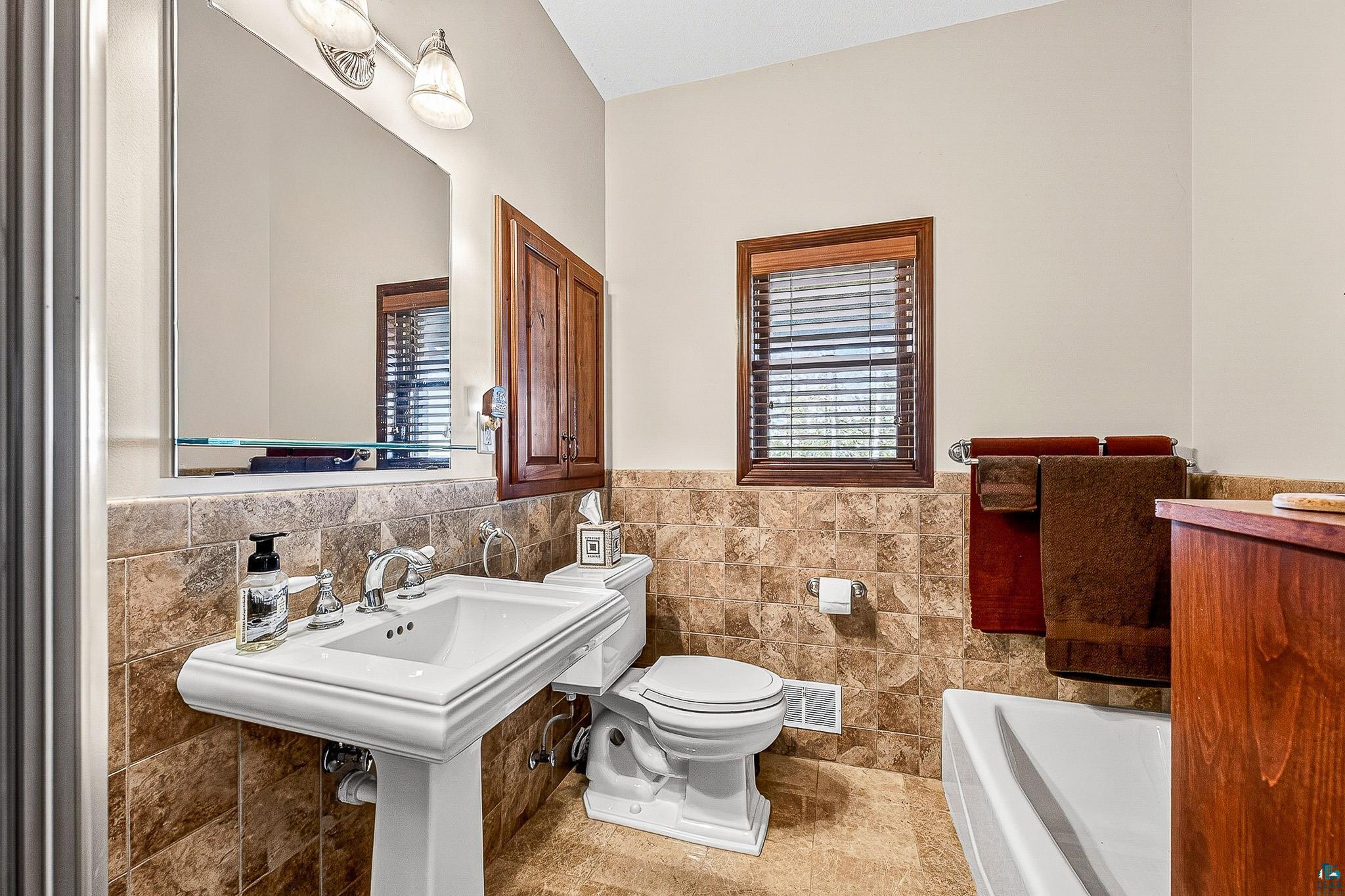 55285 Corbine Road Ashland, WI 54806 - Photo 19 of 44 Main house owner's private bathroom