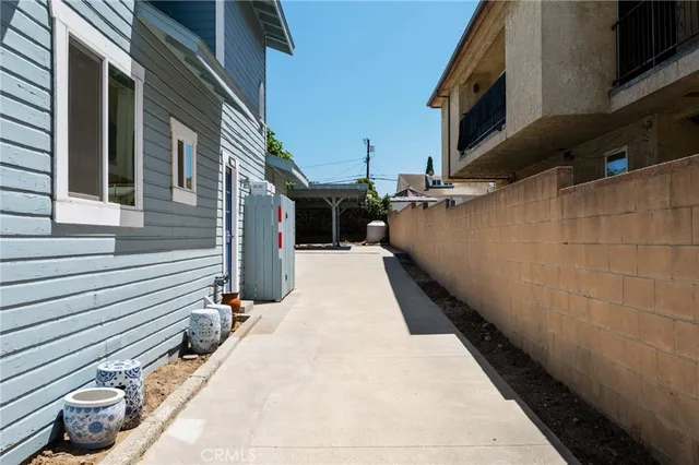 a view of a balcony with chair and tables