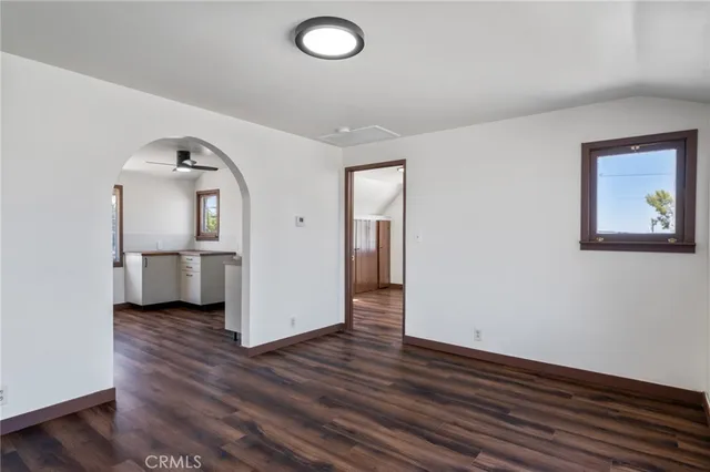 a view of a livingroom with wooden floor