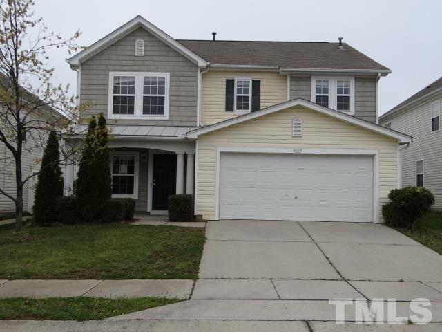 4027 Flat Sedge Lane Raleigh, NC 27604 - Photo 1 of 11 front view of a house with a yard