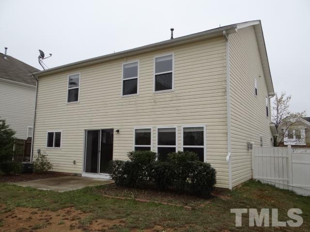 4027 Flat Sedge Lane Raleigh, NC 27604 - Photo 11 of 11 a front view of a house with a yard