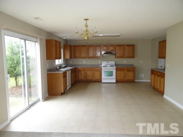 4027 Flat Sedge Lane Raleigh, NC 27604 - Photo 5 of 11 a kitchen with sink and window