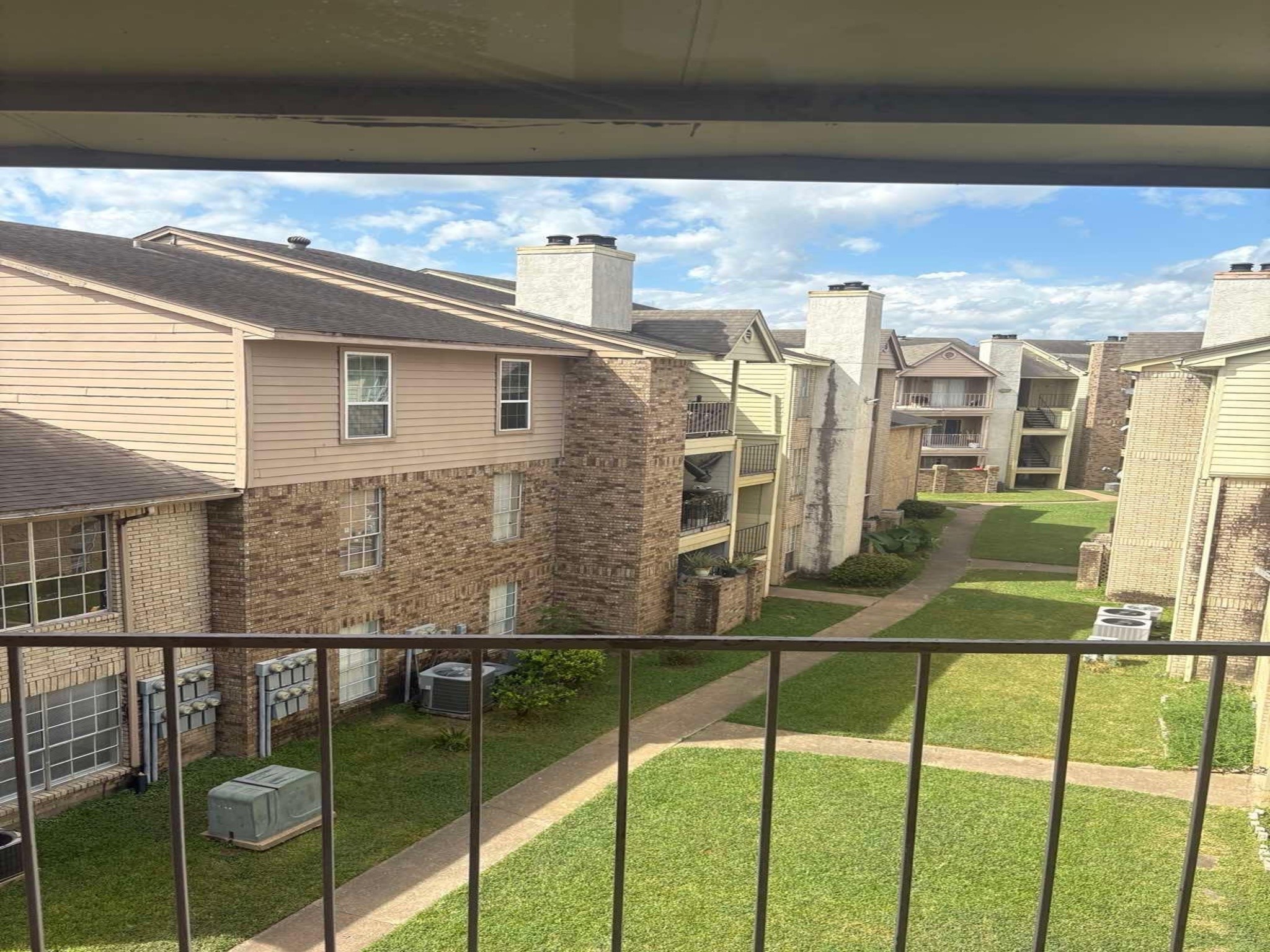 10101 South Gessner Road, Unit 515 Houston, TX 77071 - Photo 10 of 10 a view of a balcony with chairs