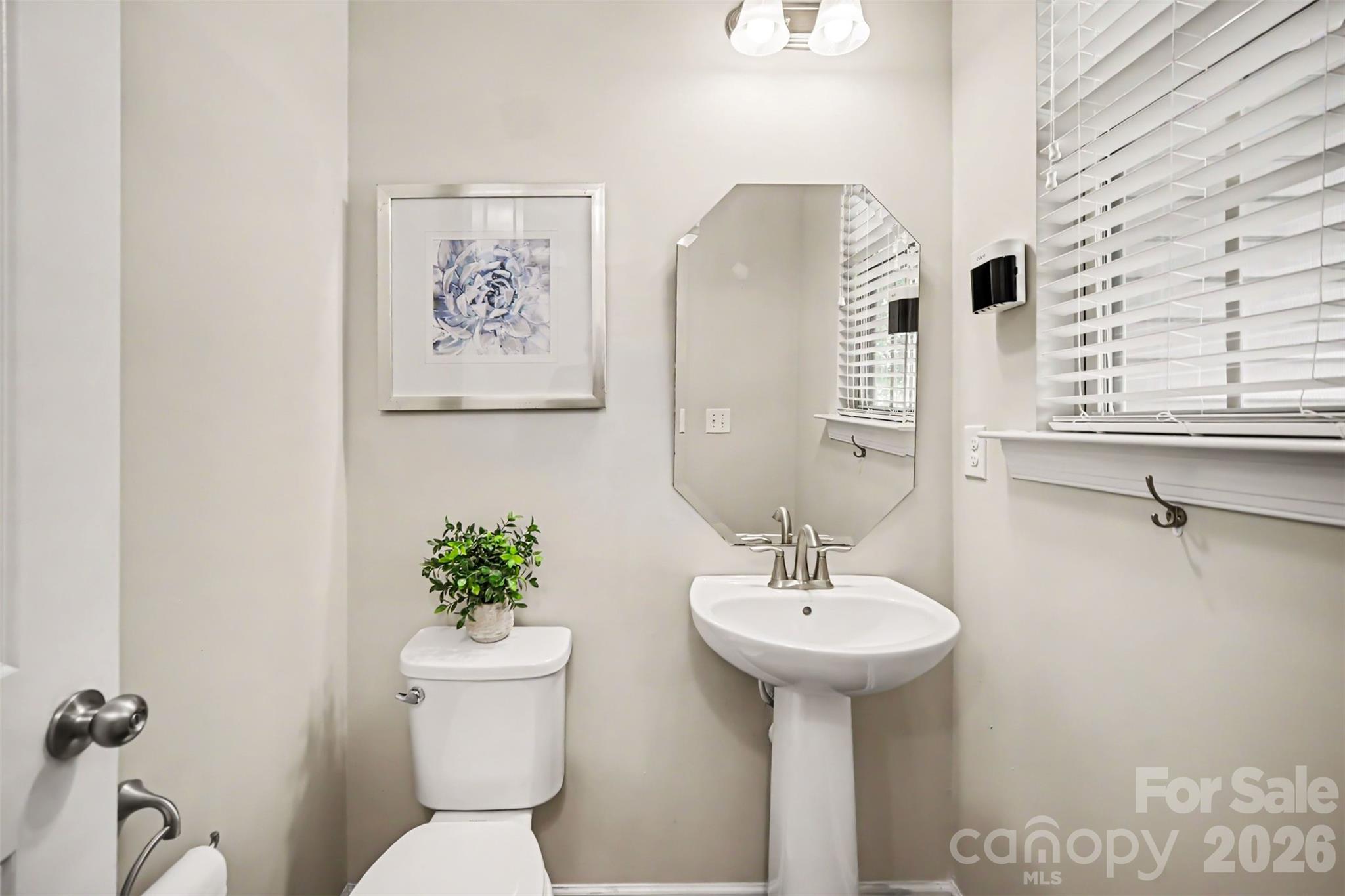 1029 Archibald Avenue Fort Mill, SC 29708 - Photo 15 of 45 a bathroom with a sink toilet and a mirror