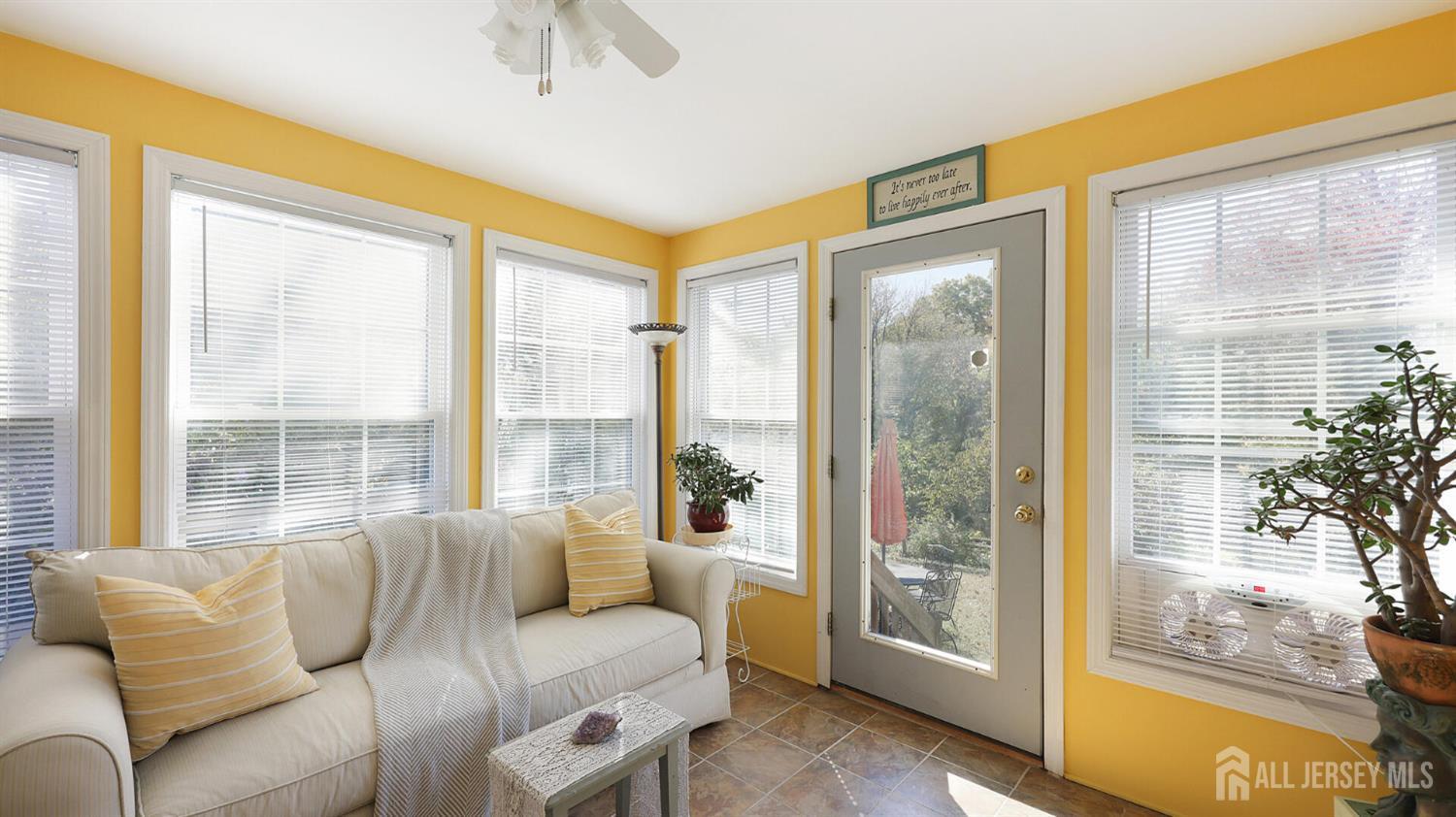 10 Bruning Road East Brunswick, NJ 08816 - Photo 15 of 40 a living room with furniture and a large window