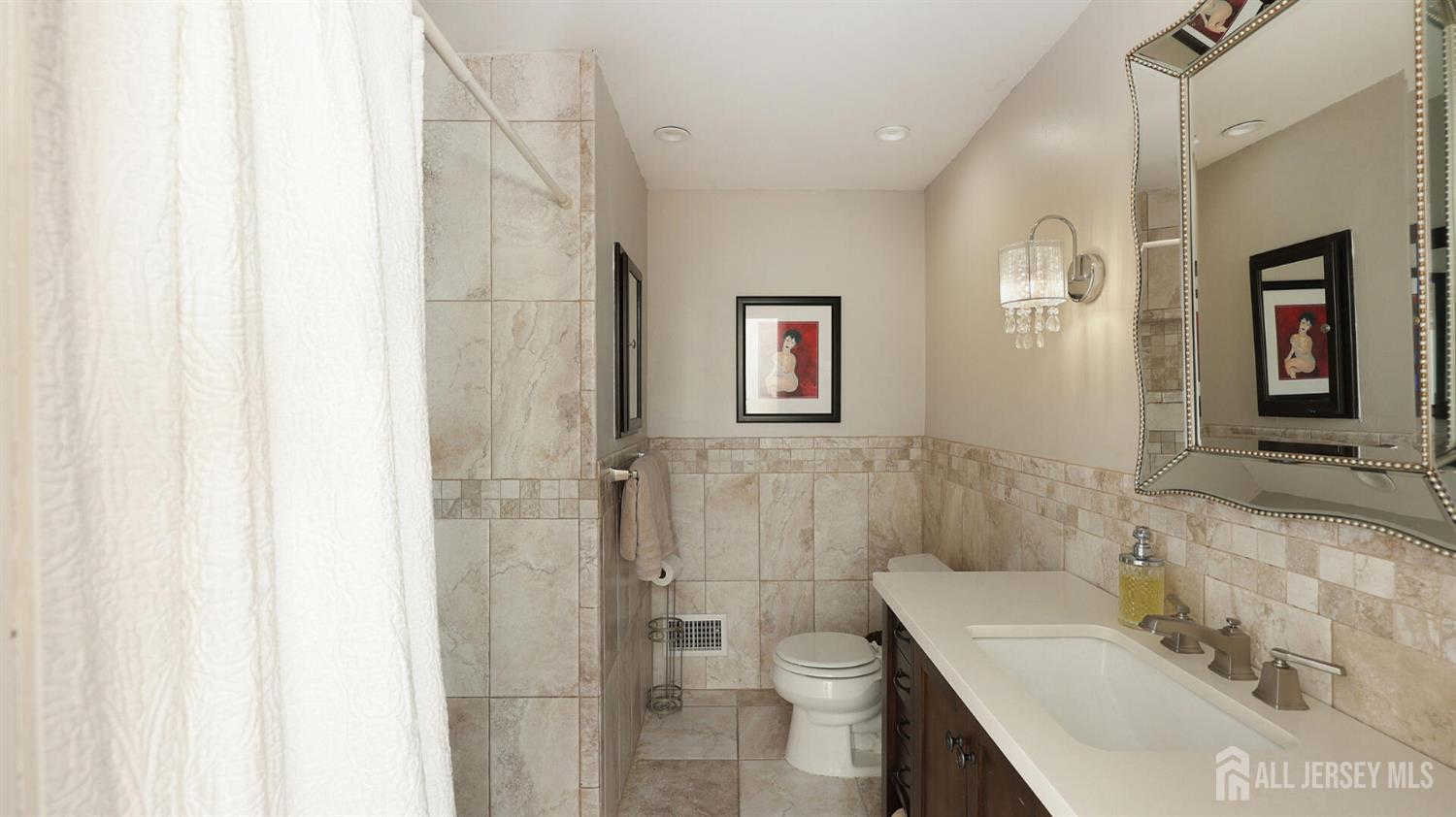 10 Bruning Road East Brunswick, NJ 08816 - Photo 24 of 40 a bathroom with a sink toilet and shower
