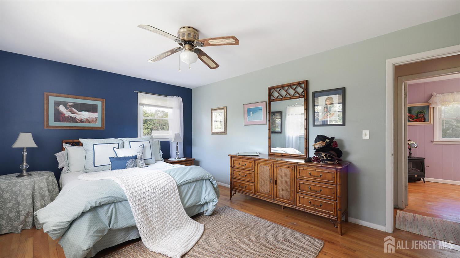 10 Bruning Road East Brunswick, NJ 08816 - Photo 27 of 40 a bedroom with a bed and wooden floor