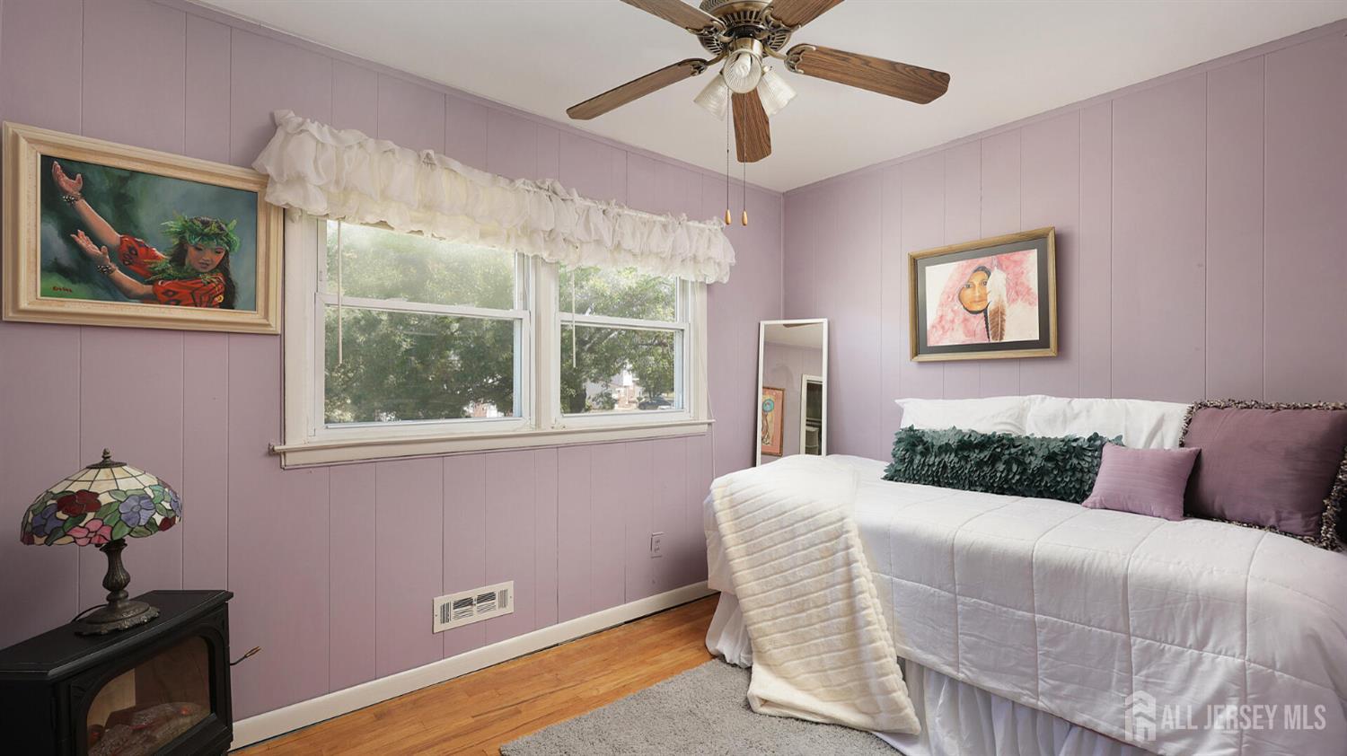 10 Bruning Road East Brunswick, NJ 08816 - Photo 29 of 40 a bedroom with a bed and a painting on the wall