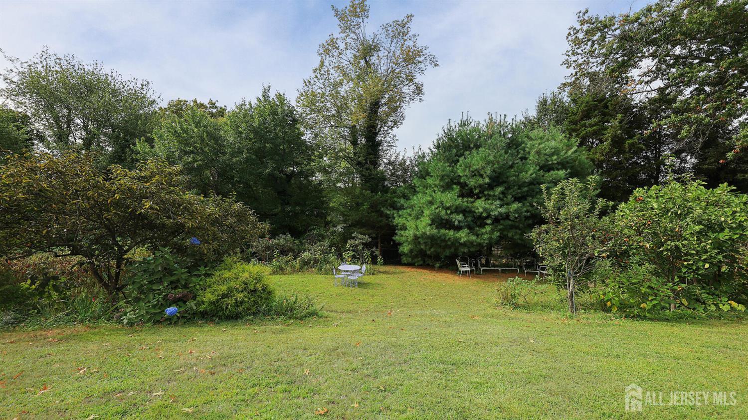 10 Bruning Road East Brunswick, NJ 08816 - Photo 39 of 40 a view of outdoor space with a garden and trees