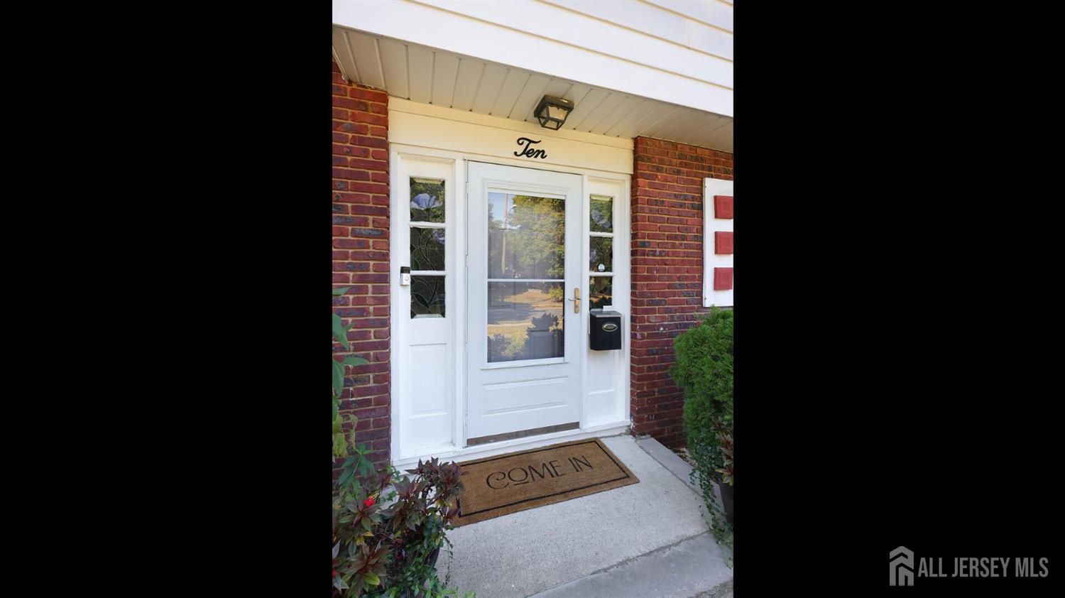 10 Bruning Road East Brunswick, NJ 08816 - Photo 4 of 40 a front view of a house with a yard