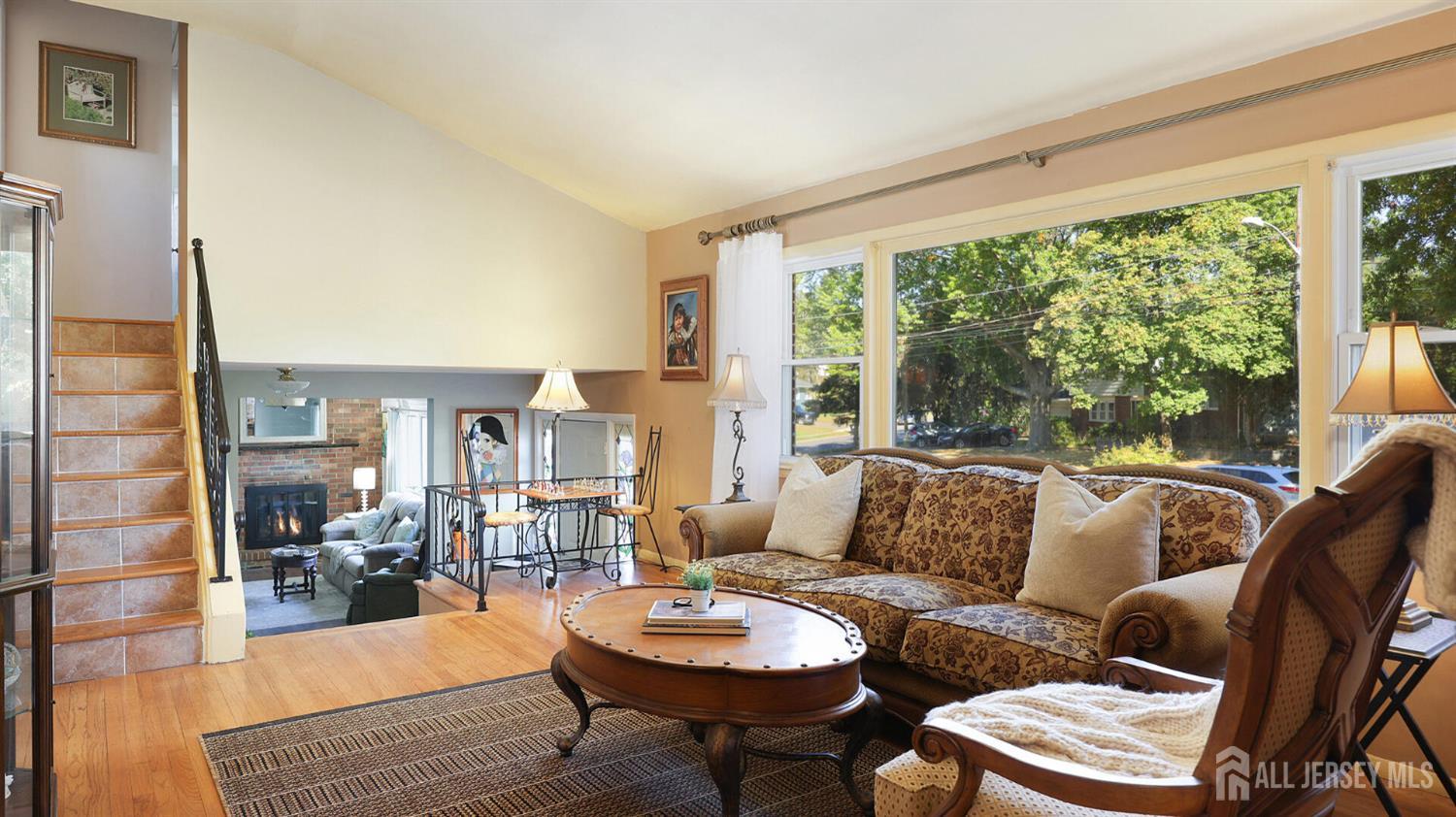 10 Bruning Road East Brunswick, NJ 08816 - Photo 6 of 40 a living room with furniture and a large window
