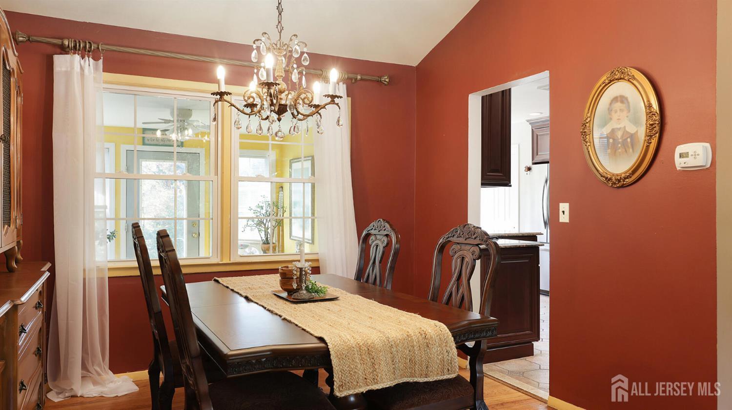 10 Bruning Road East Brunswick, NJ 08816 - Photo 8 of 40 a view of a dining room with furniture and chandelier