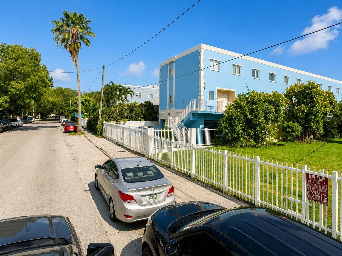 829 Southwest 2nd Street Miami, FL 33130 - Photo 3 of 4 a front view of a house with garden